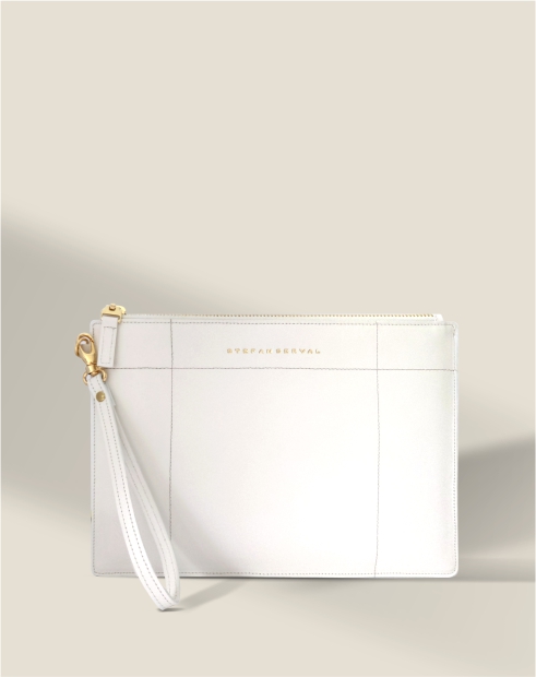 Handmade slim leather pouch and clutch bag for everyday versatility and evening elegance.