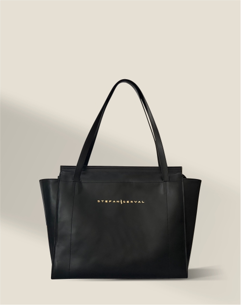 Handcrafted structured leather handbags - artistic vision and engineering discipline