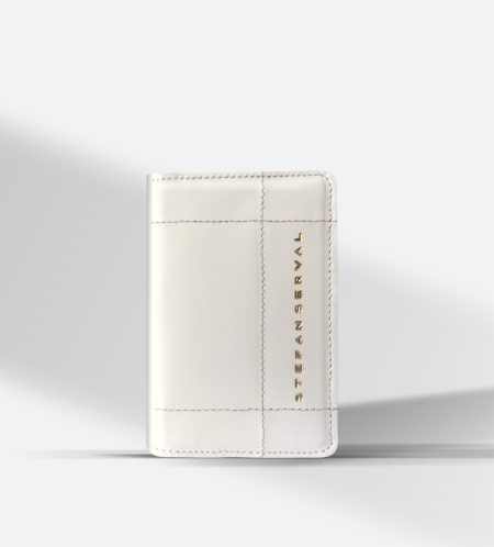 Perspective view of Stefan Serval Entrata Superiore compact folding wallet in light beige Italian leather.
